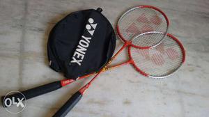 Unused Triumph Badminton case with Yonex Racket pair.