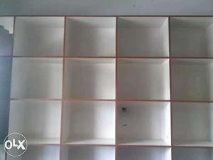 White And Brown Cubby Shelf