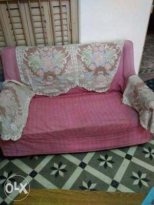 Wooden sofa 5 years old with covers