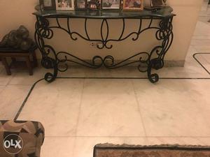 Wrought iron table with a marble top