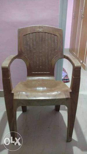 2 plastic chairs available for immediate sale in