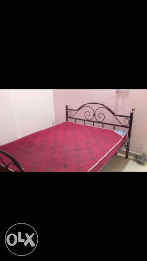 7 year old Metal bed with matress in good