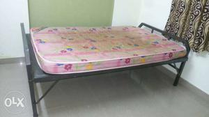 Black Metal Bed With Pink Floral Mattress