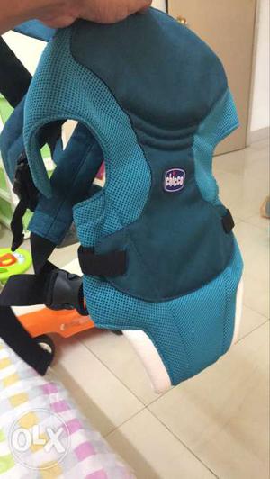 Baby's Teal And Black Chicco Carrier