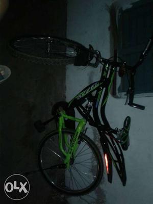 Black And Green Hercules Hard-tail Bicycle