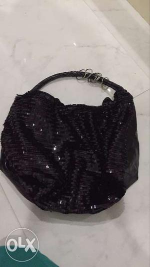 Black shining handbag
