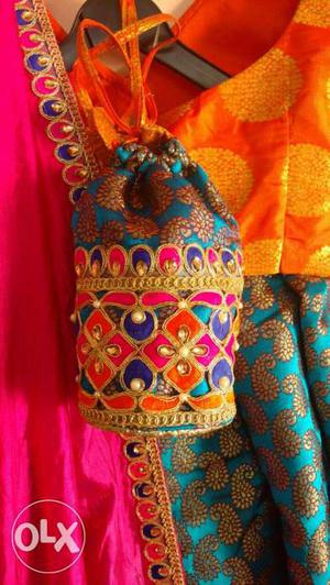Brocade lehenga and blouse with a matching chunri