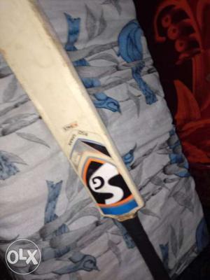 Brown, Black, And White SG Cricket Bat