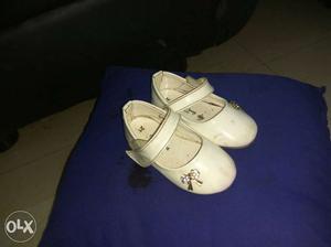 Girl's Pair Of White Mary Jane Shoes