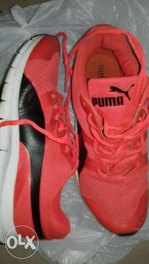 Pair Of Red-and-black Puma Running Shoes