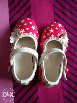 Pair Of Red-and-white Monogram Star Print Mary Jane Shoes