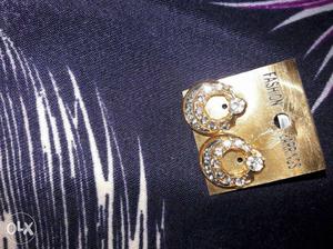 Pair Of Silver And Gold Fashion Earrings