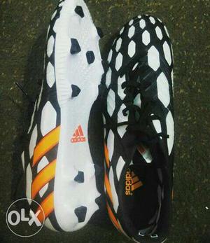 Pair Of White-black-and-yellow Adidas Soccer Cleats