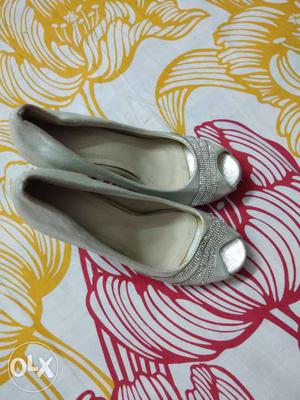 Partywear silver shoe's 2.5 inches in good