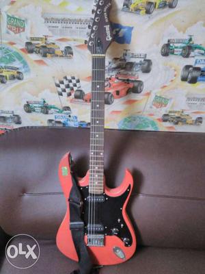 Pink And Black Electric Guitar