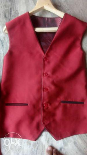 Red Vest In Kottayam