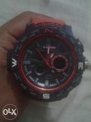 Round Black And Red Casio G-Shock Watch