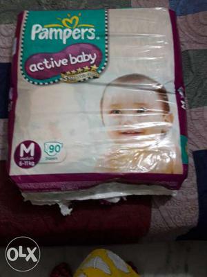 This is PAMPERS ACTIVE BABY DIAPER OF MEDIUM SIZE