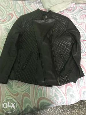 This is pure leather jacket. only used once.it is