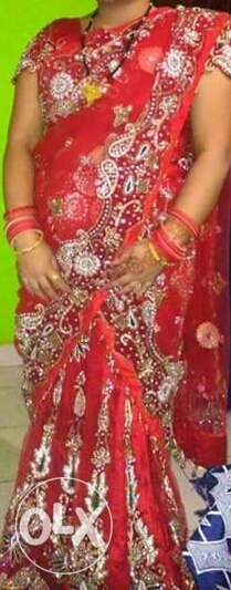 Tomato red colour bridal lehnga in very good