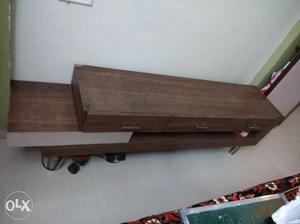 5 feet long and 1.5 feet tall... TV stand..