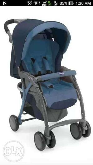 Baby's Blue And Black Chicco Stroller