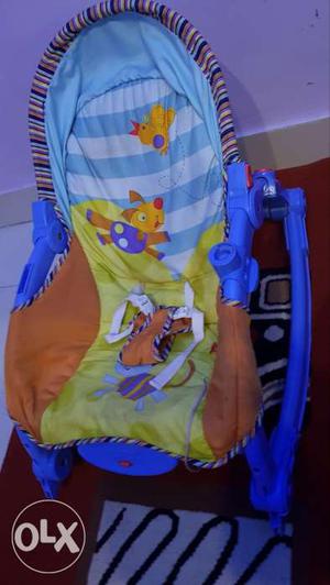 Baby's Blue And Green Rocker Bouncer