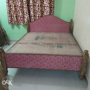 Brown And Red Wooden Bed Frame