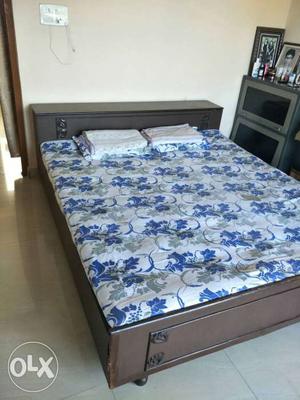 Brown Wooden Bed Frame White And Blue Floral Bed Sheet Set