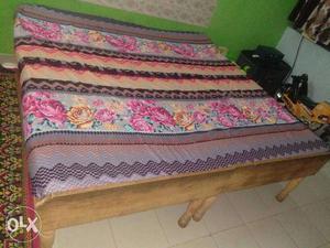 Double Bed (6ft * 6ft) without storage.