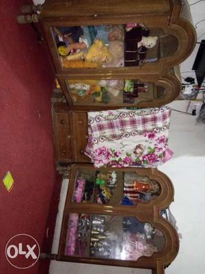 Four Brown Wooden Curio Cabinets