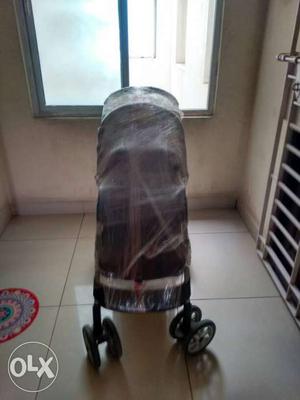 Gracco dark maroon stroller/ pram.. used very