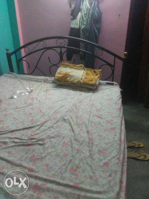 Iron cot with reliance mattress