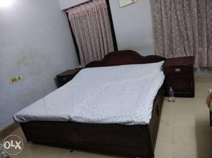 One year old king size bed with mattress. Very