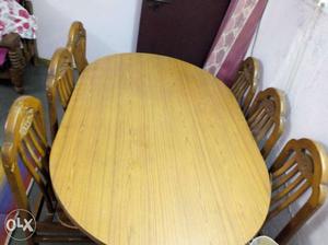 Oval Brown Wooden Table With Chairs Dining Set