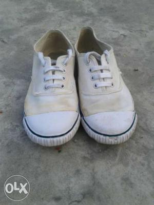 Pair Of White school shoes