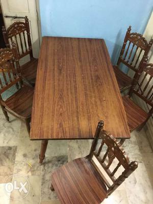 Teak wood and decolum Dining table and 5 chairs