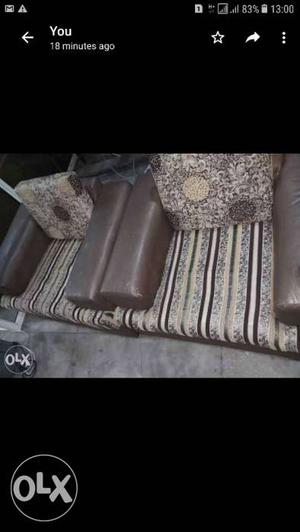 Two Brown Leather Base Padded Sofa Chairs Screenshot
