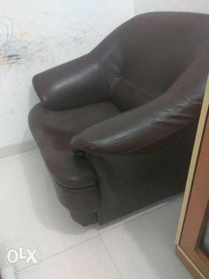 Two Brown colour leather sofas