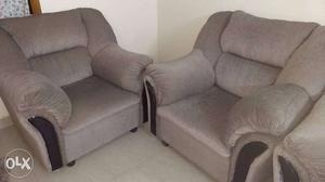 Two Gray Fabric Sofa Chairs