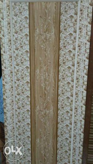 White And Brown Wooden Floral Board