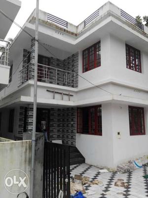 White-and-red Concrete 3-storey House