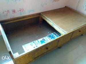 Wooden bed in good condition interested buyers