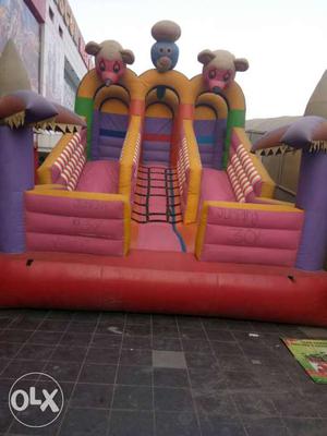 Yellow And Pink Inflatable Bouncer Slide