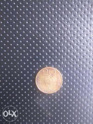 46 year old coin 20 paisa lotus symbol