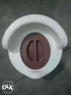 Baby's White And Brown Potty Trainer