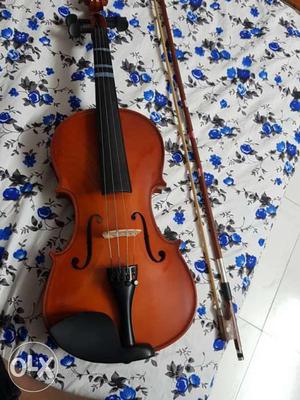 Brown And Black Violin Set