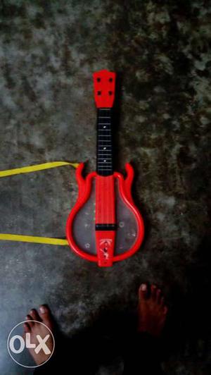 Children's Red And Black Guitar