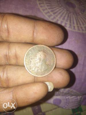 Its  quarter anna coin. it completed 98
