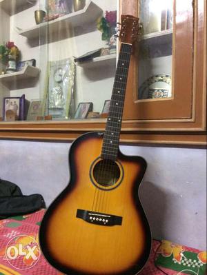 New acostic guitar only 4 month old.with 4 pluged and